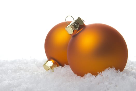 christmas, orange christmas balls on snow 