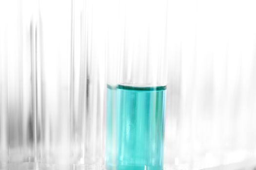 test tubes with blue liquid 