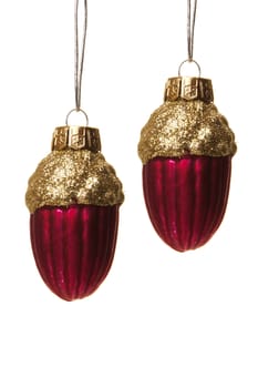 red and golden christmas balls as hazelnut hanging isolated 