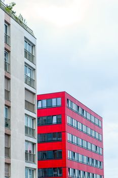 Two Apartment Buildings, one house in red