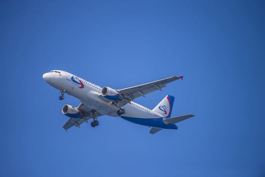 Airbus a320, Ural Airlines, Russia. The pictures of the planes are shot very close an airport just before landing. September 2013.