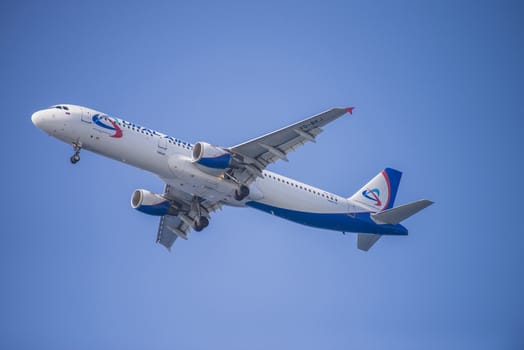 Airbus a320, Ural Airlines, Russia. The pictures of the planes are shot very close an airport just before landing. September 2013.