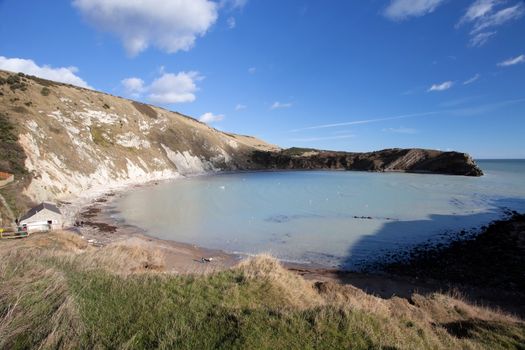 Idyllic Lulworth Cove famous UK landmark coastline