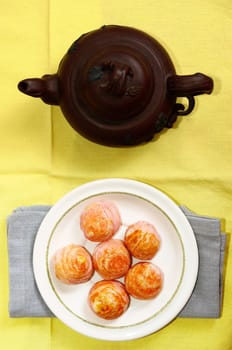 Moon cake with tea pot