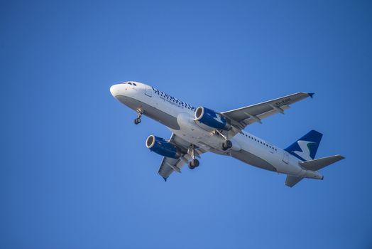 Livingston airline, Italy, Airbus a320-214. The pictures of the planes are shot very close an airport just before landing. September 2013.