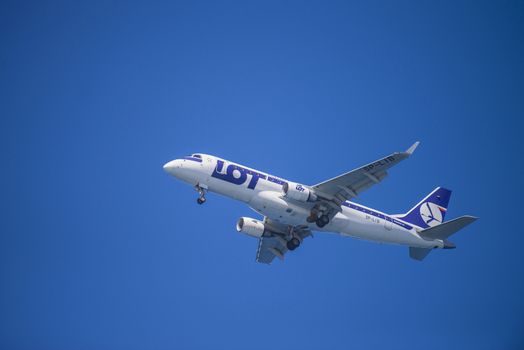 Lot, Polish Airlines, Poland, Embraer 175. The pictures of the planes are shot very close an airport just before landing. September 2013.
