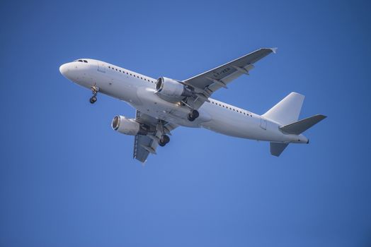 Vilnius, Lithuania, Ly-Ver Avion Express, Airbus a320-212. The pictures of the planes are shot very close an airport just before landing. September 2013.