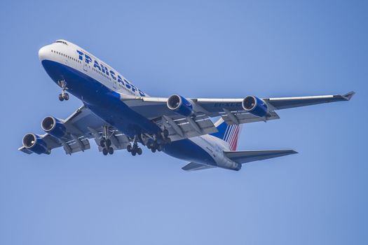 Transaero airlines, Russian, Boeing 747. The pictures of the planes are shot very close an airport just before landing. September 2013.