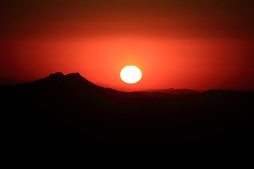 Sunrise view from nemrut mountain with silhuettes