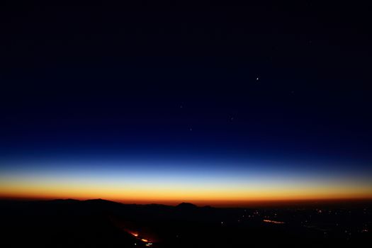 Sunrise view from nemrut mountain with silhuettes