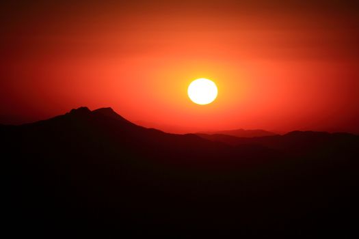 Sunrise view from nemrut mountain with silhuettes