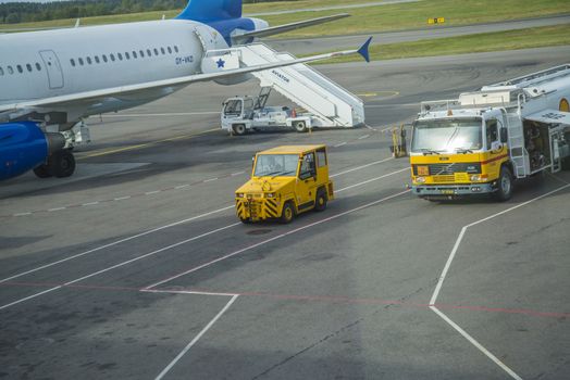 Truck tractors at the airport. Image is shot at Moss Airport Rygge, Norway. September 2013.