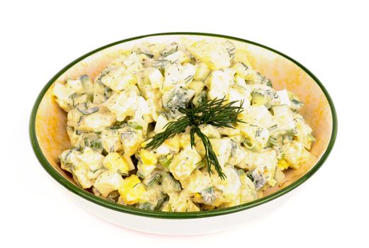 Delicious Freshly Made Creamy Potato Salad in Beige Rustic Bowl isolated on white background
