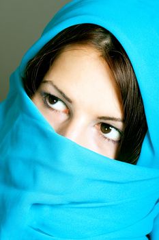 portrait of beautiful arabic woman wearing scarf