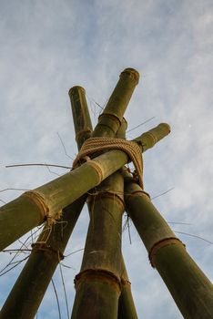 Bamboo poles tied together as a symbol of unity.