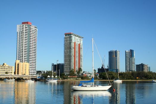 City of Southport on the Gold Coast Australia seen across the Nerang River in the early morning.