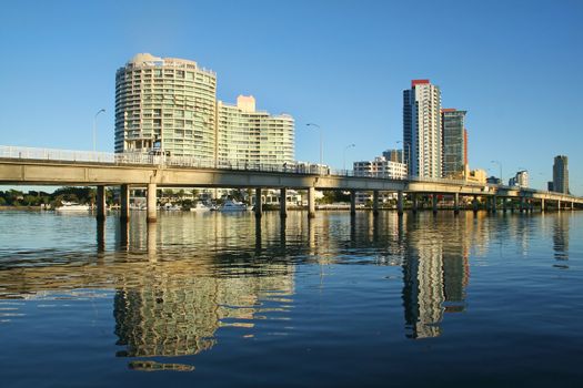 The Sundale Bridge at Southport Gold Coast Australia with reflections in the water just after sunrise.