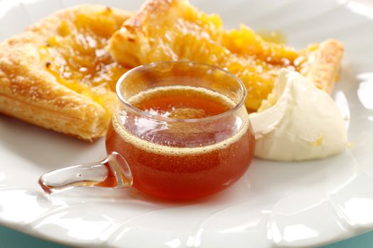 Sweet pineapple syrup with delicious pineapple galettes.