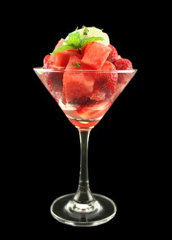 Strawberry and watermelon pieces with natural yogurt and mint.
