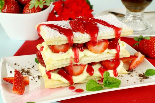 Delicious strawberry mille feuille with fresh strawberries and Vienna coffee.