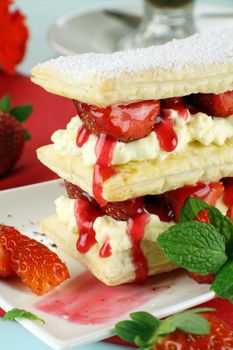 Delicious strawberry mille feuille with fresh strawberries and Vienna coffee.