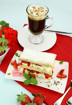 Delicious strawberry mille feuille with fresh strawberries and Vienna coffee.