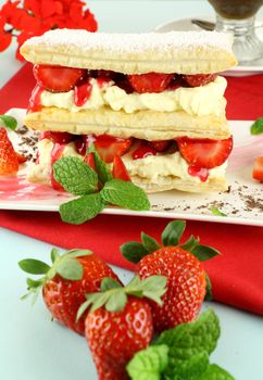 Delicious strawberry mille feuille with fresh strawberries and Vienna coffee.