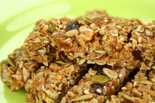 Homemade toasted muesli finger snacks and milk ready to serve.