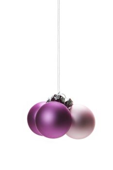 pink christmas balls isolated hanging with white background 