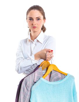Studio picture of beautiful teenage girl with clothes. Isolated white background