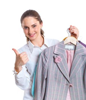 Studio picture of beautiful teenage girl with clothes. Isolated white background