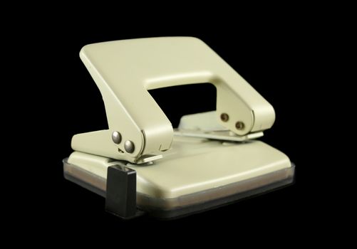 Two hole punch used for punching holes in paper.