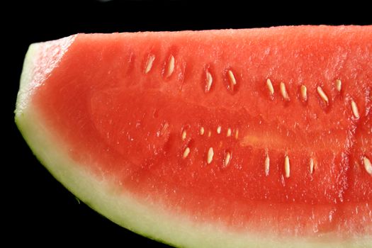 Close up of a section of a slice of watermelon.