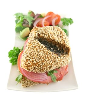 Pastrami and salad wholegrain seeded roll ready to serve.