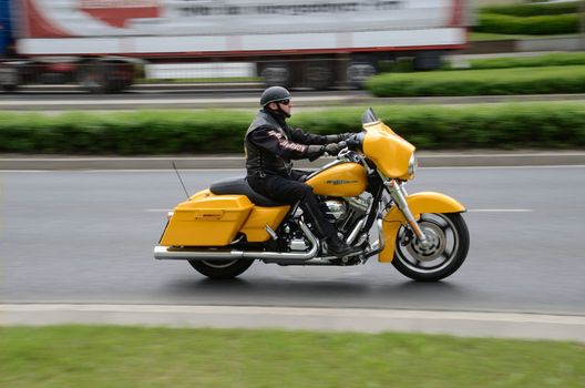 WROCLAW, POLAND - MAY 18: Unidentified motorcyclist rides Harley-Davidson motor during parade Super Rally. Around 8 thousands riders joined this event from 16 to 20 May 2013 in Wroclaw.