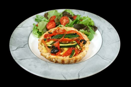 Delicious Mediterranean style vegetable and ricotta tart with salad.