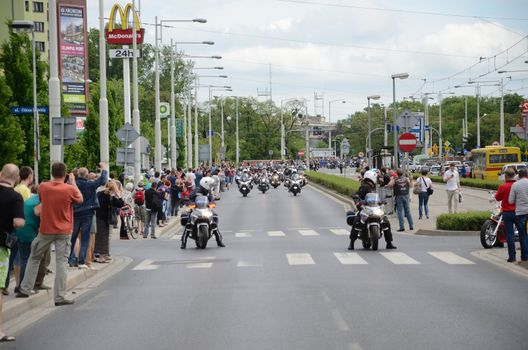 WROCLAW, POLAND - MAY 18: Unidentified group rides Harley-Davidson in city center. Around 8 thousands motorcyclist joined international event Super Rally from 16 to 20 May 2013 in Wroclaw, Poland.