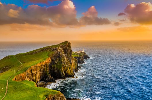 Colorful ocean coast sunset at Neist point lighthouse, Scotland, United Kingdom