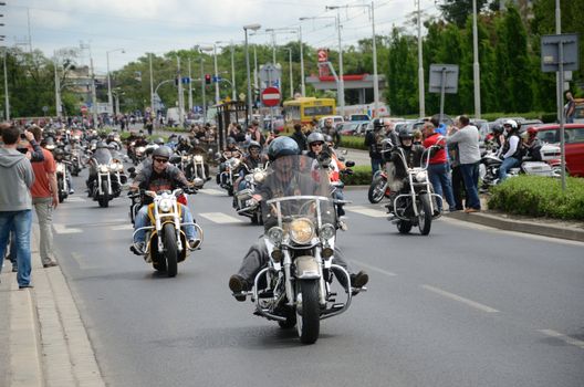 WROCLAW, POLAND - MAY 18: Unidentified group rides Harley-Davidson in city center. Around 8 thousands motorcyclist joined international event Super Rally from 16 to 20 May 2013 in Wroclaw, Poland.