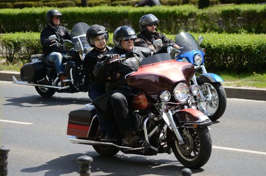 WROCLAW, POLAND - MAY 18: Unidentified group rides Harley-Davidson in city center. Around 8 thousands motorcyclist joined international event Super Rally from 16 to 20 May 2013 in Wroclaw, Poland.