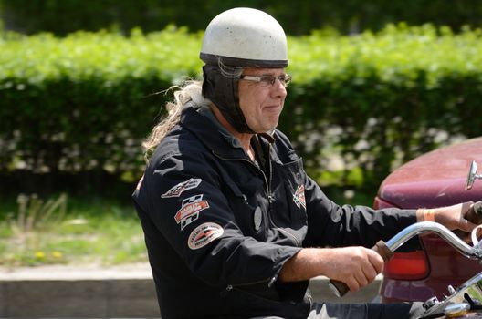 WROCLAW, POLAND - MAY 18: Unidentified motorcyclist rides Harley-Davidson motor during parade Super Rally. Around 8 thousands riders joined this event from 16 to 20 May 2013 in Wroclaw.