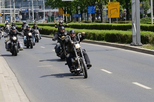 WROCLAW, POLAND - MAY 18: Unidentified group rides Harley-Davidson in city center. Around 8 thousands motorcyclist joined international event Super Rally from 16 to 20 May 2013 in Wroclaw, Poland.