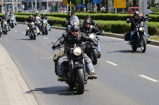 WROCLAW, POLAND - MAY 18: Unidentified group rides Harley-Davidson in city center. Around 8 thousands motorcyclist joined international event Super Rally from 16 to 20 May 2013 in Wroclaw, Poland.