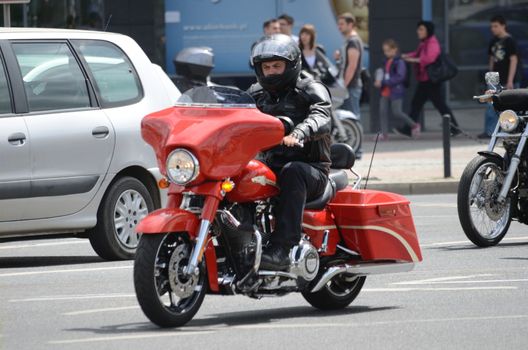 WROCLAW, POLAND - MAY 18: Unidentified motorcyclist rides Harley-Davidson motor during parade Super Rally. Around 8 thousands riders joined this event from 16 to 20 May 2013 in Wroclaw.