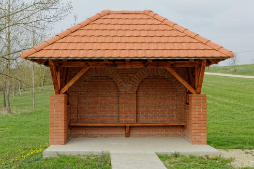 small brick house on the field