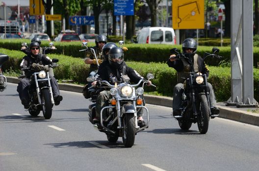 WROCLAW, POLAND - MAY 18: Unidentified group rides Harley-Davidson in city center. Around 8 thousands motorcyclist joined international event Super Rally from 16 to 20 May 2013 in Wroclaw, Poland.