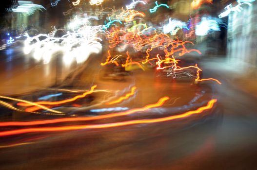 Speeding cars on the motorway city traffic at night. Motion blur.