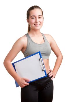 Personal Trainer, with a pad in his hand, isolated in white