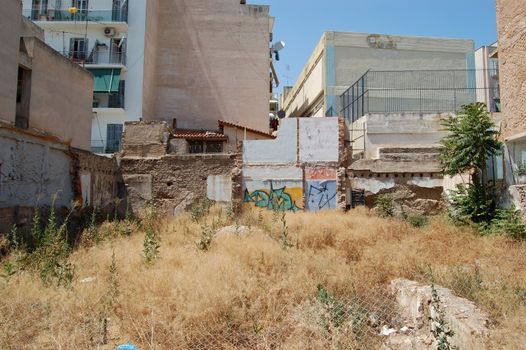 Empty urban space where apartment building block was demolished.