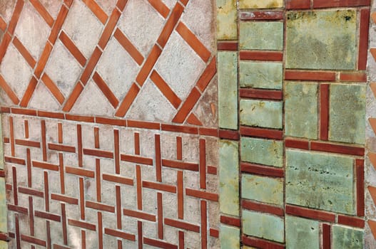 Geometric shapes pattern on old wall. Abstract background.